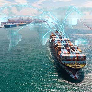 Cargo ship with containers and an overlay of a digital world map.